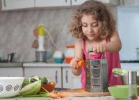 How old should a child be when they are able to fix their own plate and cut their own food?