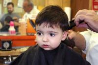 Do you think there's a proper age to start taking boys for haircuts?