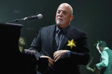 Jewish Telegraphic Agency, reported their disapproval of Billy Joel wearing the Yellow Star at a show at Madison Square Garden in New York City, Aug. 21, 2017, as well as Nev Schulman, star of MTV's sort-of reality show 