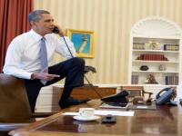 Obama puts foot on desk, triggers anger by some