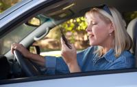 What should you legally not be allowed to do while driving a car? Take the survey.