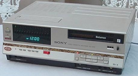Sony developed the Beta system in the early 1970s to provide a magnetic tape storage system that was easier to use than reels of tape. These early video cassettes were large and not for home use. In 1975, Sony Betamax was unleashed for home videos. This gave an opportunity for the public to watch and/or record movies. The price was $2,000 to $2,300 (in 1975 $) depending on model. Do you know anyone who bought one even with such basic features?