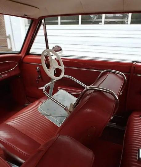 This is a child's car seat from a bygone era. I hesitate to refer to it as a 
