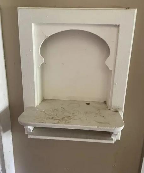 This thing looks like it was a high school shop project and was in the kitchen when we moved in. It was meant for the phone and the phone book but those have now gone and we disguise it with a potted plant. I would remove it but it might be holding the wall together. If you have repurposed yours, please tell us more. Do you still have one of these?