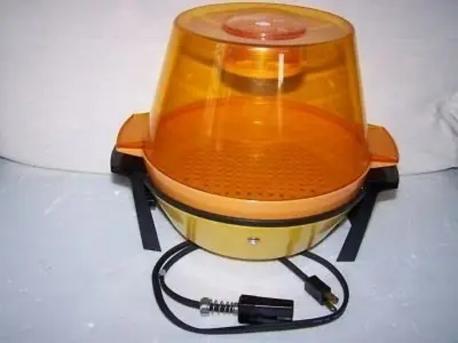 Before Orville Redenbacher and his microwave genius there was one of these popcorn makers that also was a staple in offices on a Friday afternoon. I still remember the smell of burnt kernels and the melted plastic lid. Those things sure ran hot. Did you ever have one?