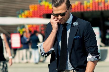 I am proud to say I didn't wreck a perfectly good jacket or coat by rolling up the sleeves. It didn't make sense then and it doesn't now. Yet this became part of