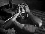 I haven't read the book or seen this movie, so I don't know why this guy needs to shout so loud - I just know what it is he shouts and that many ham actors have replicated this scene in the years since the movie was released. Can you name the movie and what the one word line is? No need to shout.