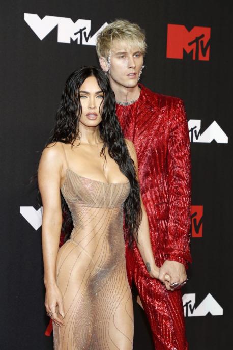 Actress Megan Fox (photographed here with her fiance Machine Gun Kelly) is a naked dress frequent wearer. While many men will cheer and applaud her provocative looks, women on the other hand think that this will give men more chances to sexually objectify women. Do you think this will further put women into the category of 