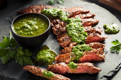 Chimichurri is a standard at a local Brazilian steakhouse where I live. I don't eat steaks anymore but I've used Chimichurri to marinate a variety of meats for cooking. If you don't want to make the sauce from scratch, it's available at many stores and ready to be used from the jar. Are you interested in using this flavorful sauce for cooking or as a condiment?