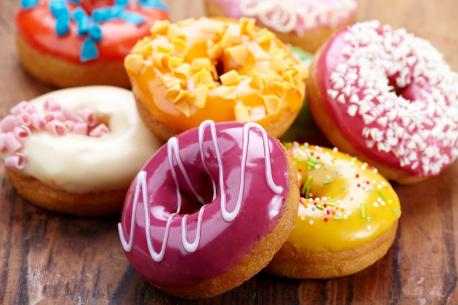 Sometimes a good helping of a crispy, crunchy, sweet or salty snack is just what we need to remedy a bad mood or a tough day. Ever wondered why doughnuts have holes? One theory suggests it may have been to help the pastries cook more evenly. According to food lore, American sailor Hansen Gregory created the doughnut's modern shape around 1847 while at sea; by his account, doughnuts of the time were twisted or diamond-shaped and often cooked faster on the outsides than in the centers. Removing the dense middles helped create uniformly cooked treats that fried quickly and didn't absorb as much oil. Have you ever eaten doughnuts?
