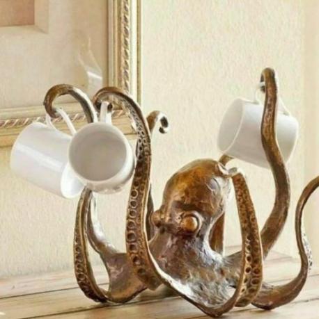 Are you tired of searching for your favorite mug? Here we have a really handy solution. The octopus cup organizer is the perfect solution for those who could use some help organizing their cupboards. Putting aside how strange octopuses (Yes, that's the correct pluralization!) really are, would you use this in your kitchen?