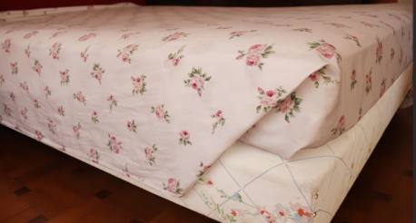Mom usually bought soft pastel or pretty, flower-sprigged sheets. Happily, fitted bottom sheets were standard in her linen closet. But like her own mother, she was a champ at hospital corners when she placed the top sheet on the bed. Do you make your beds using hospital corners?