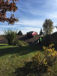 The owner of the house is an 83 year old woman. The home about 20 miles northeast of Lansing is built next to a hill, and the roof is nearly level with the ground. State police said the Mustang went through several bushes, trees and a fence before stopping on the roof. The driver was treated for low blood sugar but wasn't hurt. Usually these accidents are weather related, but sometimes medical. Has anyone ever crashed into your house?