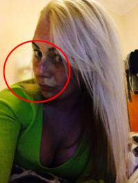 Natasha Boden, 26, from Blackpool, Lancashire, took this picture of herself after dyeing her hair blonde, only to find the shape of a spirit face on her shoulder in the resulting image. Do you see a ghost in this picture?