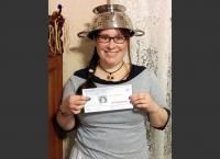 Lowell, Massachusetts, resident Lindsay Miller recently won a legal battle to allow her to wear the traditional Pastafarian colander head covering in her driver's license photo. The Massachusetts Registry of Motor Vehicles typically doesn't allow people to wear hats or head coverings in their license photos, but the American Humanist Society filed an appeal on Miller's behalf. Lawyer Patty DeJuneas said that Pastafarianism is a 