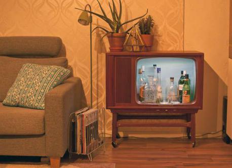 Would you consider taking an old TV and turn it into a mini bar?