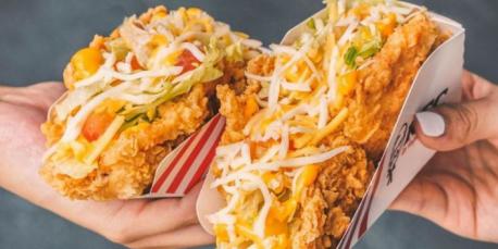 Now KFC (Kentucky Fried Chicken) has gotten in the game. The taco shell is made out of fried chicken! The Kentaco is filled with lettuce, tomatoes, and four different cheeses: Emmental, Romano, cheddar, and mozzarella. Does this sound good to you?