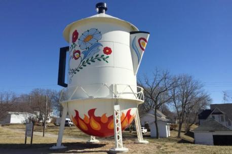 Iowa - Who wouldn't want to get their photo taken next to the world's largest Swedish coffee pot? This former water tower in Stanton is now painted with decorative flowers and hearts and could hold 800,000 cups of coffee. One more tie to coffee for this town: The actress who played Mrs. Olson in Folgers® coffee commercials happens to be from Stanton. Have you ever visited this coffee pot?