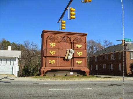 North Carolina - In High Point, North Carolina, a 32-foot-tall chest of drawers is located right off the side of the road. Built in 1926, it was intended to mark High Point as the furniture capital of the world, with two socks hanging out of the middle drawer to honor the town's hosiery industry. Have you seen this chest in person?