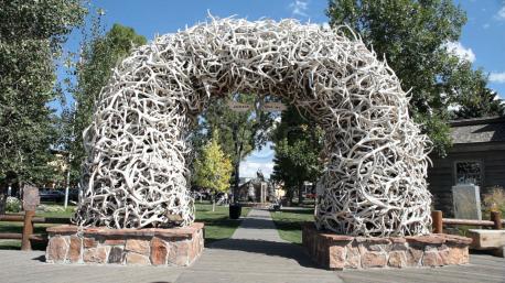 Wyoming - If you ever find yourself driving on Highway 89 in Wyoming, take a detour to see the world's largest elkhorn arch in Afton. At 75 feet wide and 18 feet high, this unique arch stretches across a four-lane street and contains more than 3,000 woven antlers. Created in 1958, the arch requires a new coat of plastic finish every year to keep it intact. Have you ever visited this arch?