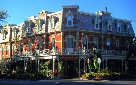 Ontario - The Prince of Wales - Established in 1864 (as the Arcade Hotel) and rebranded in 1901 as the Prince of Wales, this Victorian-style beauty sits elegantly on the corner of Picton and King Street in the beautiful Niagara-On-the-Lake region of Ontario. Guests are treated to vintage furnishing, statues, stained glass and tapestries that make each person feel like they have stepped back in time. Canopy beds, a traditional tea room and vintage wines complete the experience, as does the on-site Secret Garden Spa. Have you ever stayed at this hotel?