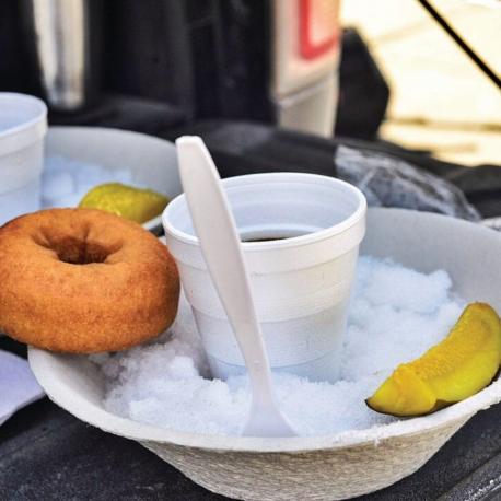 Vermont – Sugar on Snow Supper - If you've ever been to Vermont, you'll know that it can get pretty cold. In fact, it can get pretty snowy! While many people in this state are happy to simply look at the white stuff, it seems as though a large portion of locals also like it eat it. I hope they bypass the yellow snow when they are picking out the snow for their sugar on snow supper because that could be awkward. So, what is this dish? A sugar on snow supper consists of a bowl of snow topped with maple syrup and served with a donut and sometimes a pickle. I don't quite know how these flavors all work together, but apparently, they do. Have you ever had this food?