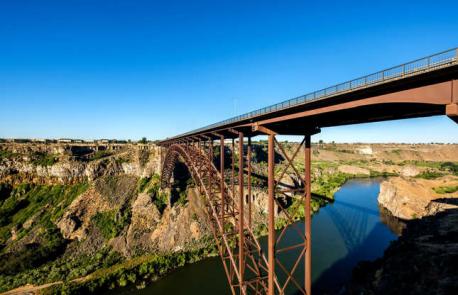Idaho: Perrine Bridge - This simple but attractive truss bridge stretches over the Snake River, close to Twin Falls. It's almost 1,500-feet (457m) long and bookended by rugged canyon. The rust-red structure is impressive whichever way you look at it. Have you ever visited this bridge?