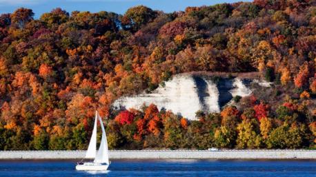 Illinois: Meeting of the Great Rivers Scenic Byway - This 30-mile stretch of road hugs the Mississippi River and connects small towns like Grafton—home to cute shops and a beloved waterfront bar—with historic, all-American Alton. Spend a couple of days in each place enjoying the autumn foliage and local apple orchards for a side of Illinois that is sure to be a pleasant surprise. Have you ever visited this destination?