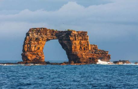 Darwin's Arch, Darwin Island, Galápagos, Ecuador - Named after biologist Charles Darwin, this 141-foot (43m) high rock formation off the southeastern coast of Darwin Island was once one of the most famous sea arches in the world. As well as being a stunning sight, it was a prime spot for scuba diving. Have you ever traveled to Ecuador?