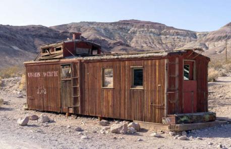 Nevada: Rhyolite, Nye County - Situated just outside the boundaries of Death Valley National Park, Rhyolite is Nevada's most intriguing ghost town. Prospectors found quartz in the area as early as 1904 and a town filled with stores, houses, a school and even hotels soon bloomed. Its success was fleeting though: by 1910, business began to decline and by 1916 Rhyolite was completely abandoned. Today reminders of the town's existence pop up across the stark landscape, from parts of an old jail to a decrepit bank building. Have you ever visited this attraction?