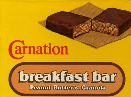 Carnation Breakfast Bars were the solid alternative to the brand's bestselling meal replacement drink mix, Instant Breakfast. The '70s-era advertisements (and the front of the wrapper) suggested that drinking a glass of milk alongside a Carnation Breakfast Bar made it a complete meal, teeming with protein, vitamins, and minerals and supplying the human body with energy — so that's what many people did. The bars were chocolate covered and came in flavors like chocolate chip, chocolate crunch, granola with raisins, granola cinnamon, and granola with peanut butter. By the 1990s however, Carnation Breakfast Bars' sales were declining. A 1994 rebranding by Nestlé (which acquired Carnation in 1984) played up the 19 vitamins and minerals contained in every bar, sold a non-chocolate-covered version, and even included an informational phone line at the bottom of the ads that skeptics could call to make statements or ask questions. The efforts weren't enough. Carnation Breakfast Bars vanished in 1997. In the mid-2010s Nestlé sold a similar product, the Carnation Breakfast Essentials Nutrition Bar — but it failed to fill the void left by the original Carnation Breakfast Bar and was eventually discontinued. Have you ever eaten a breakfast bar?