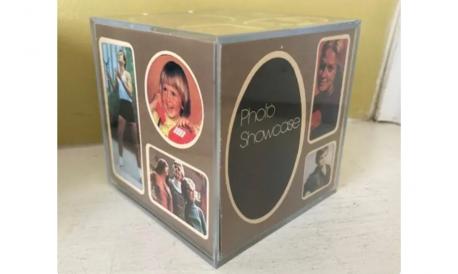 The acrylic cube photo frames that usually had photos that were at least a decade-plus old in them. Do you remember these?