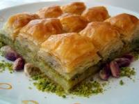 Baklava is said to have origins based in Turkey but regardless of where it came from this sweet pastry is known and loved throughout the Middle East and Europe. It's made with layers of phyllo pastry that are filled with chopped nuts, usually walnuts alongside pistachios and is sweetened with syrup that might have rosewater or honey. Would you ever try this dessert if it was offered to you?