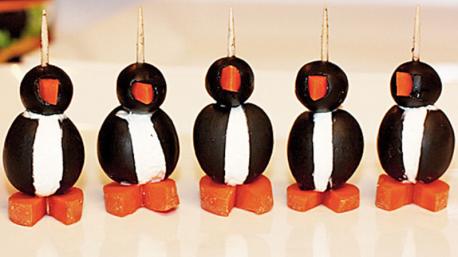 Last one for today! How about a Penguin canape made with a black olive, cream cheese, and carrot pieces?